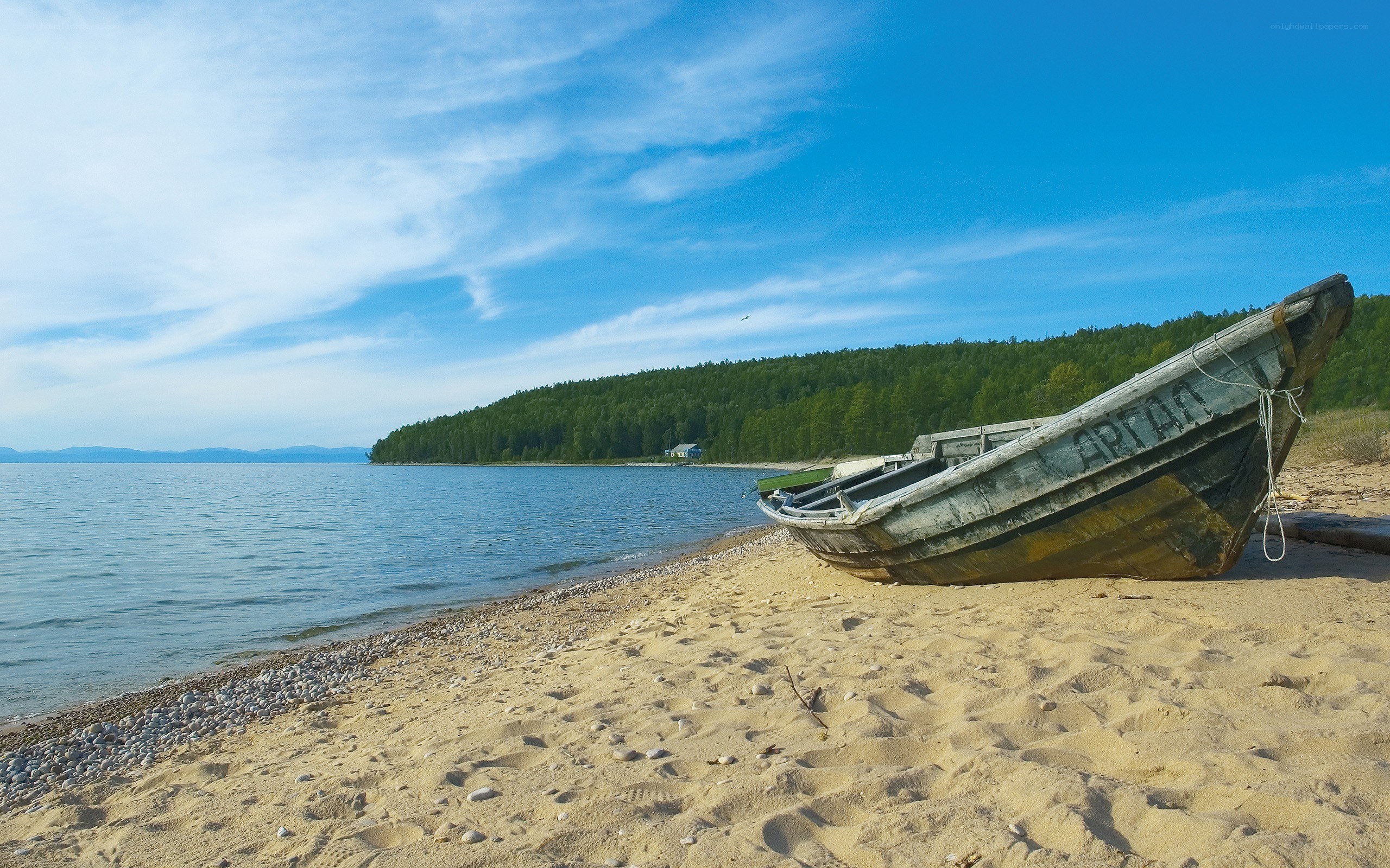 Old boat on a sandy beach