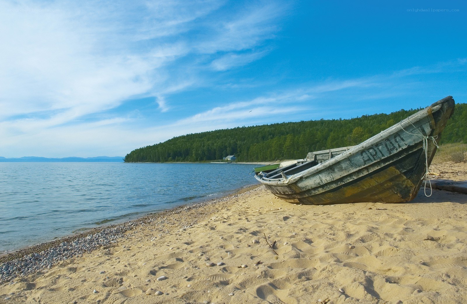 Old boat on a sandy beach