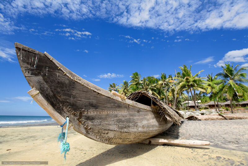 Old boat on tropical beach