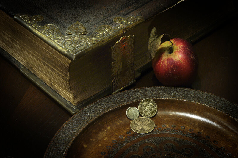Old book and apple still life