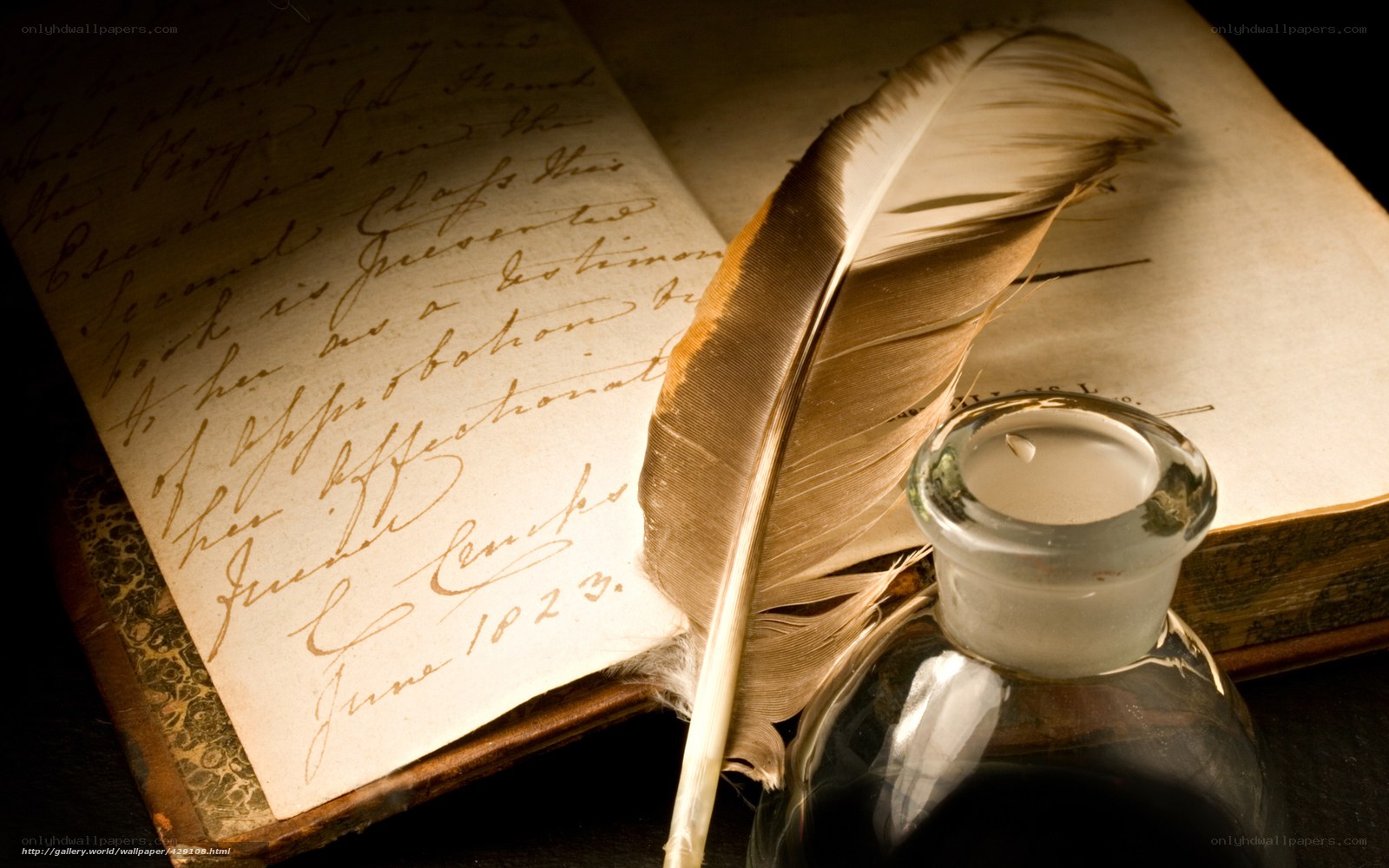 old book with quill and ink