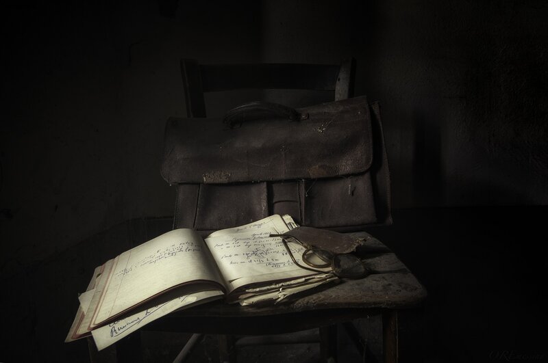 Old Books and Briefcase