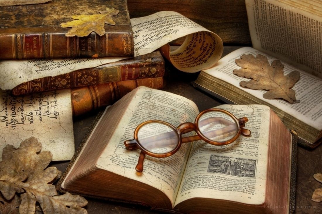 old books and reading glasses
