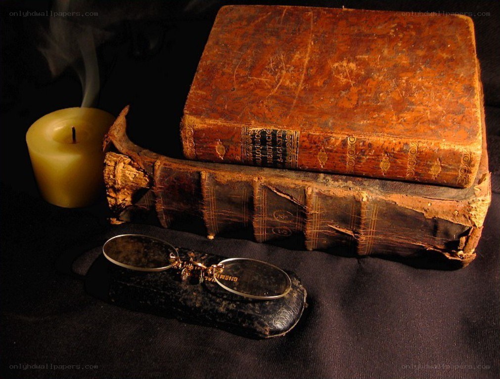 Old books and reading glasses