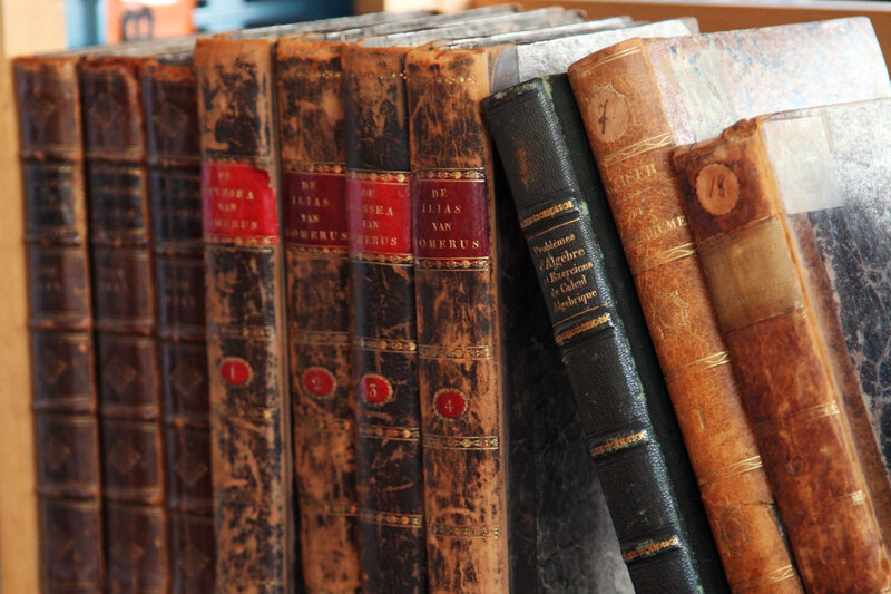Old Books on a Shelf — Brown