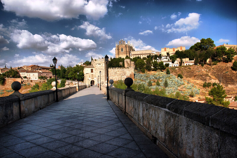 Old bridge leading to a historic city