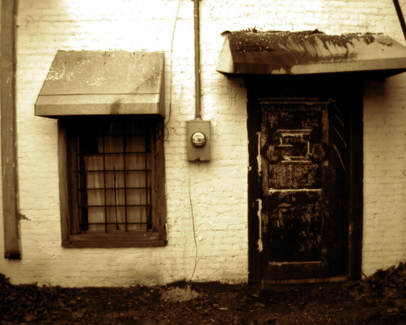 old building with door and window