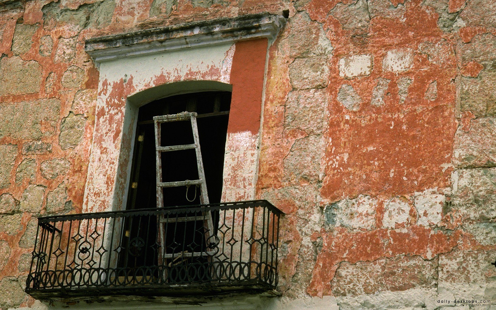 Old building with ladder in window