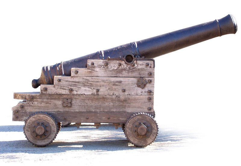 Old cannon on wooden carriage