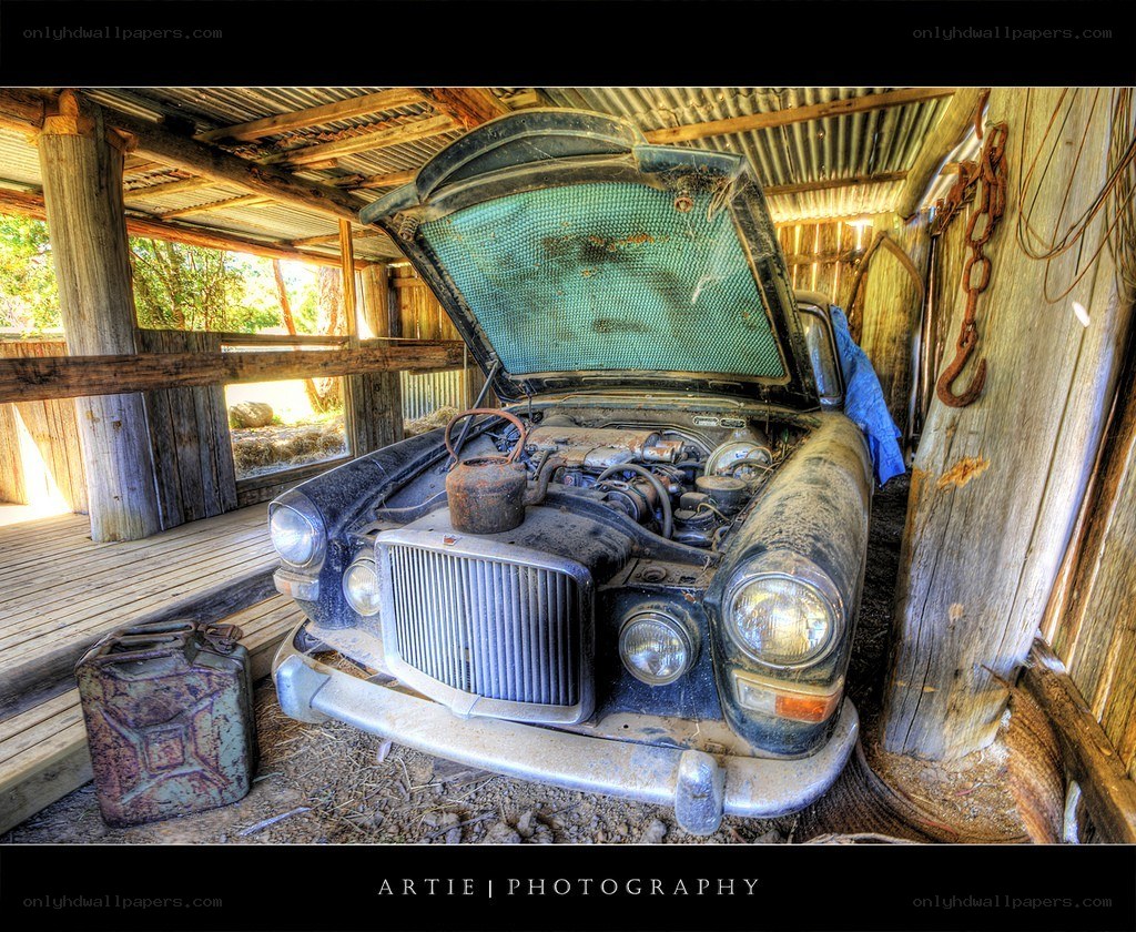 Old car in a rustic shed
