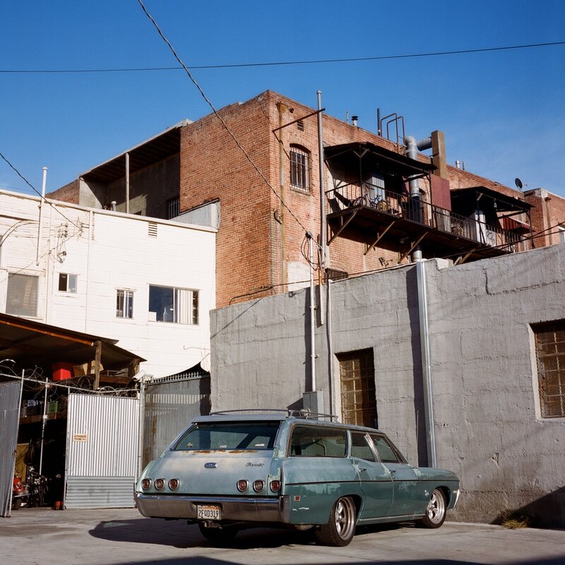 Old car in urban alley