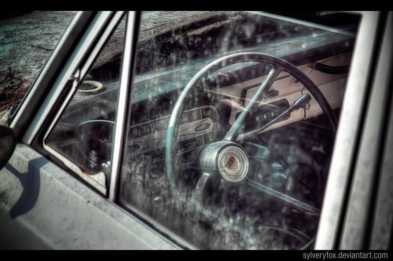 old car interior through window