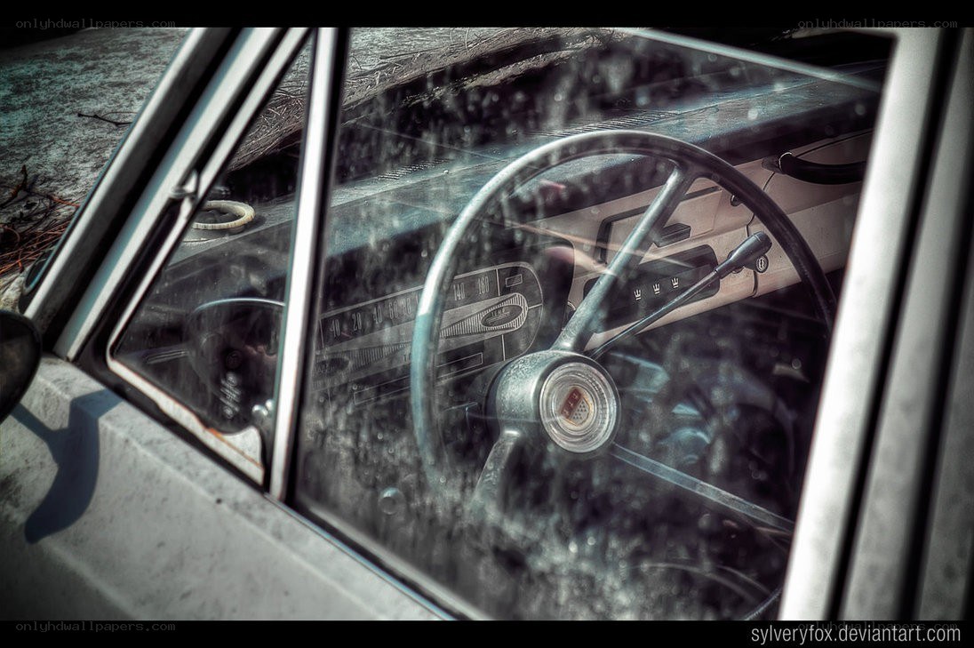 old car interior through window