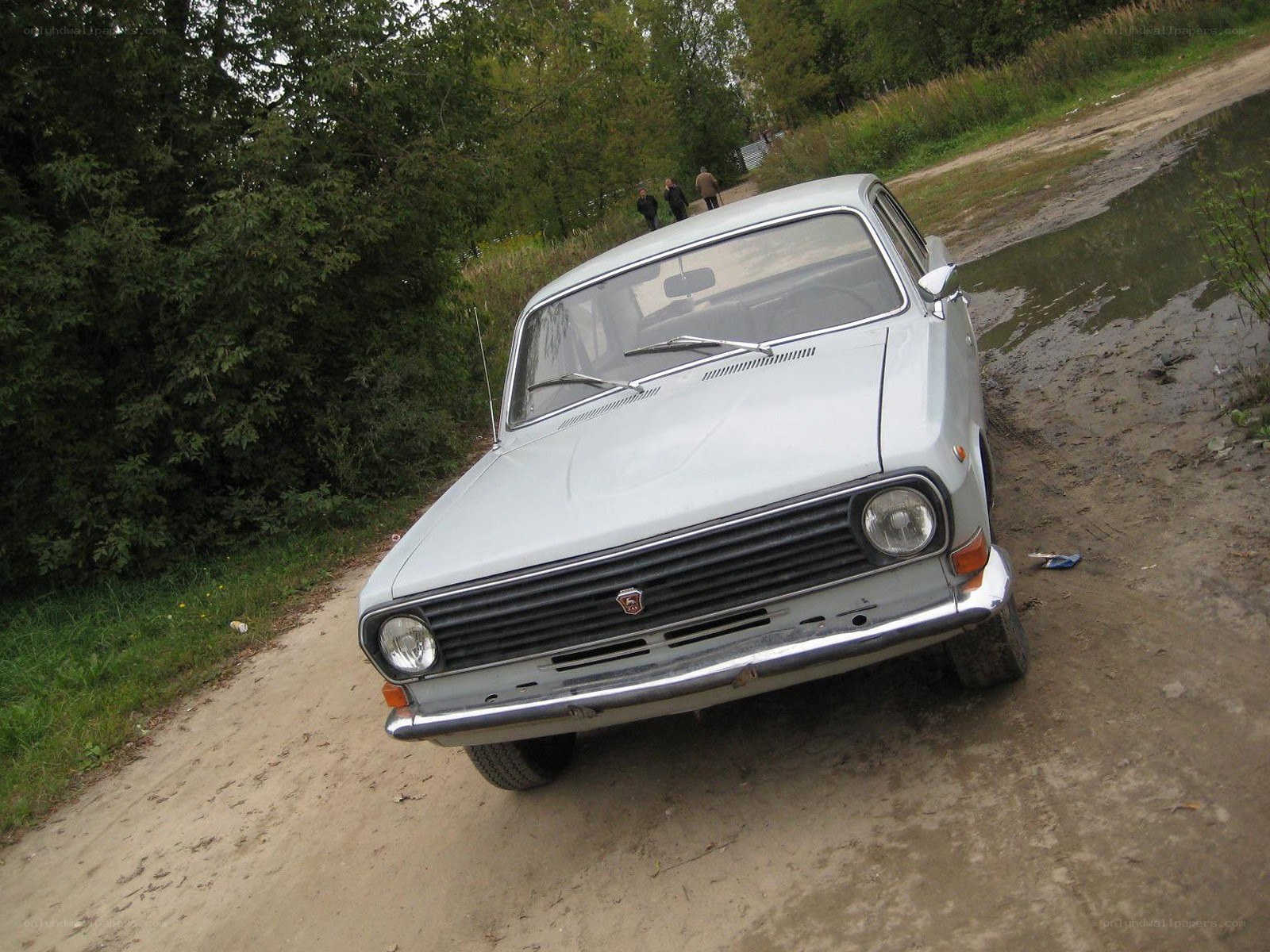Old car on a dirt road