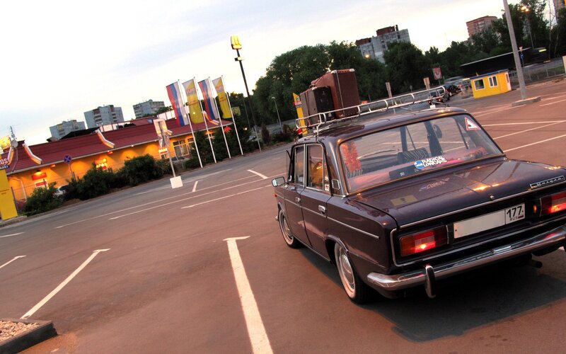 Old car with luggage on roof