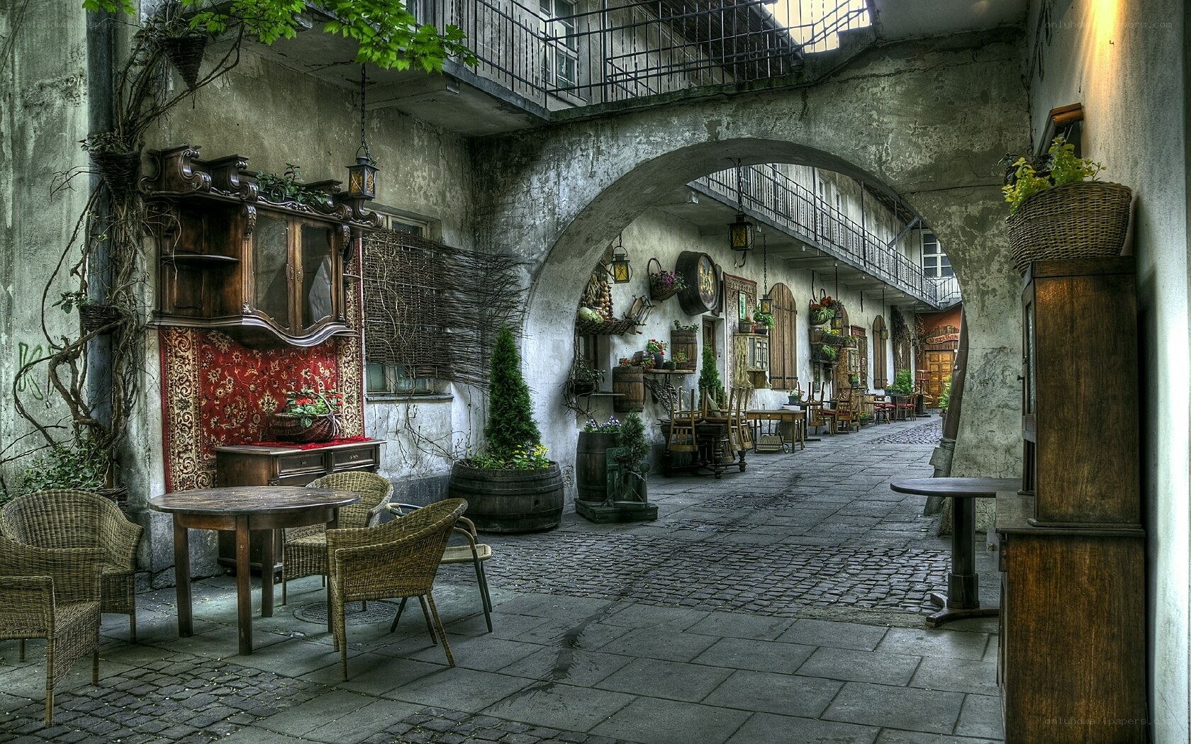 Old courtyard with tables and arches
