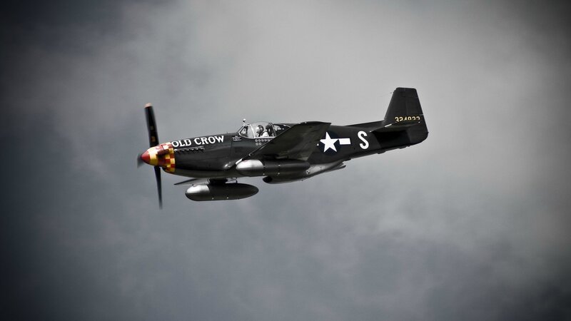 Old Crow fighter plane in flight