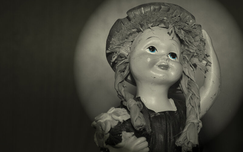 old doll with blue eyes