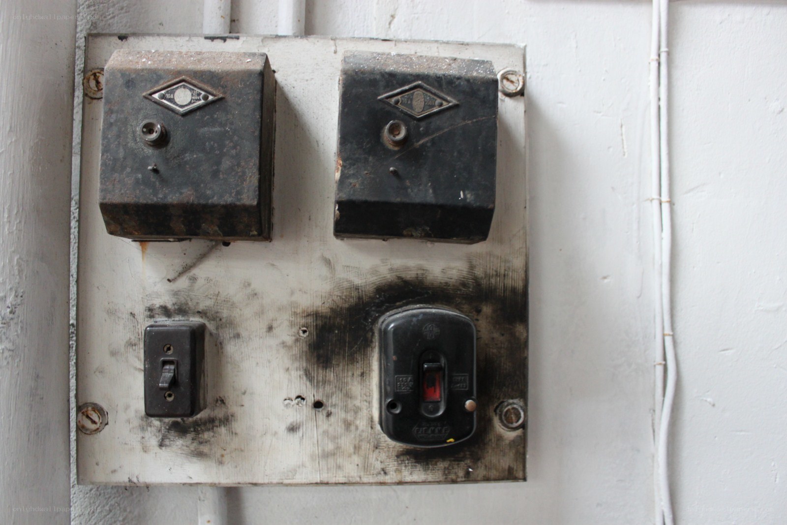 old electrical panel on wall