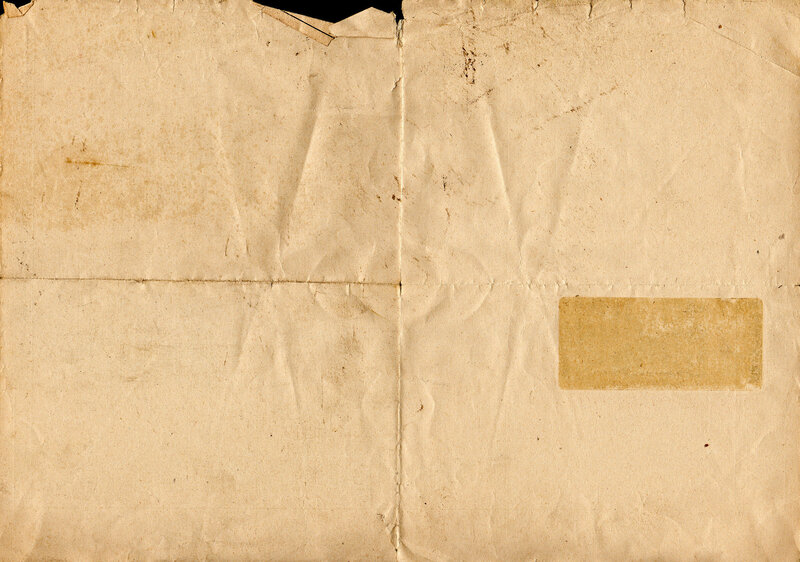 old folded paper with stain