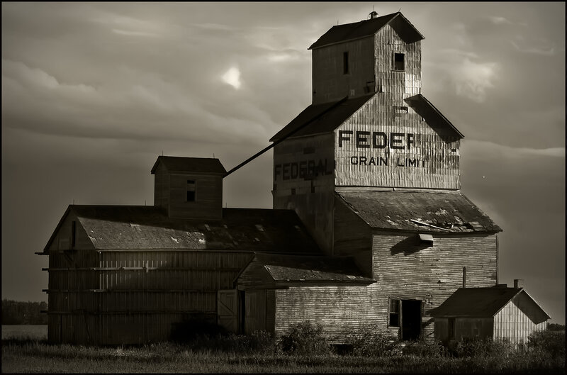 Old grain elevator in sepia
