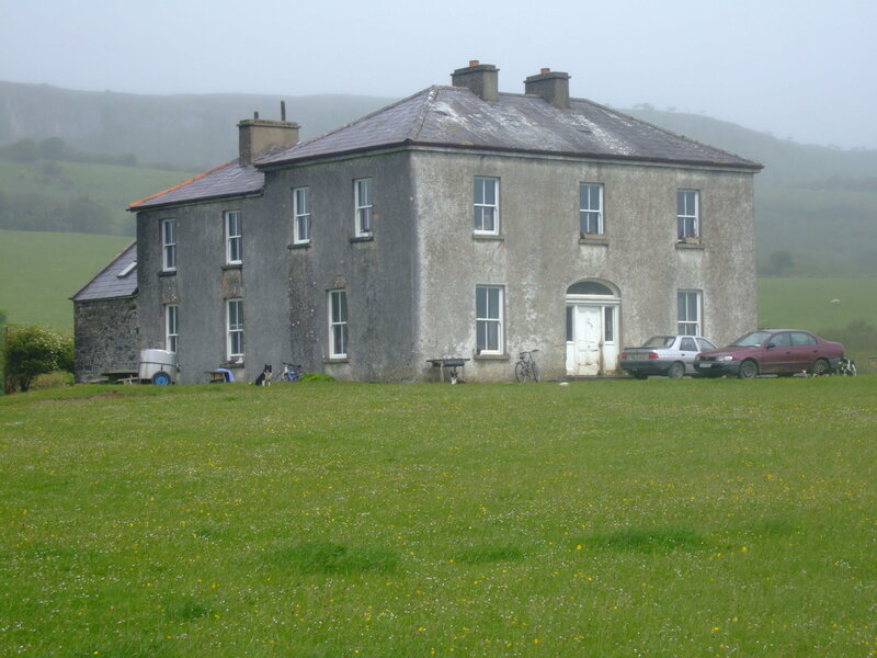 Old house in a foggy field