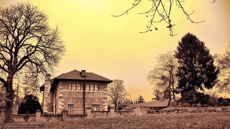 Old house in autumn landscape