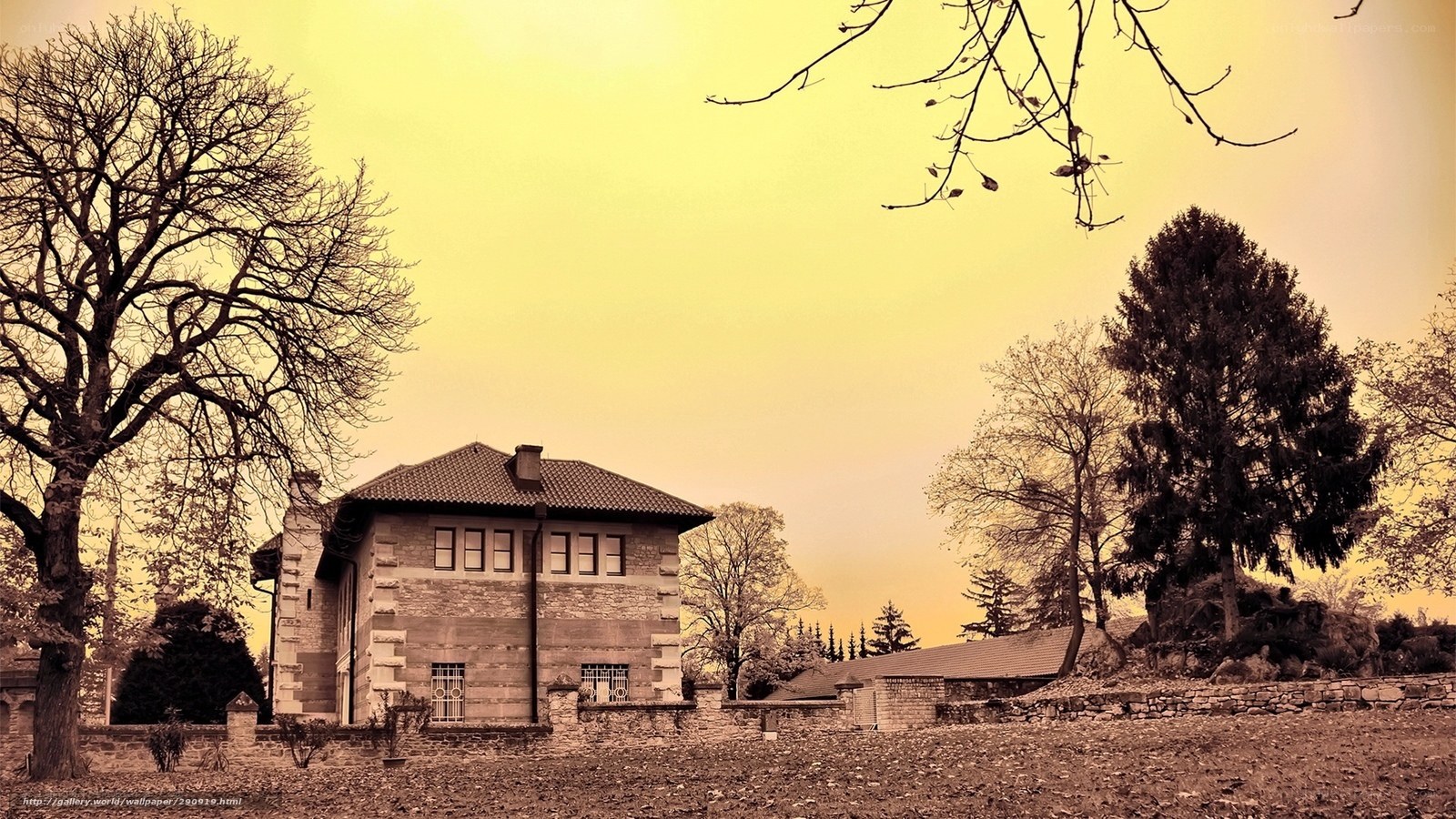 Old house in autumn landscape