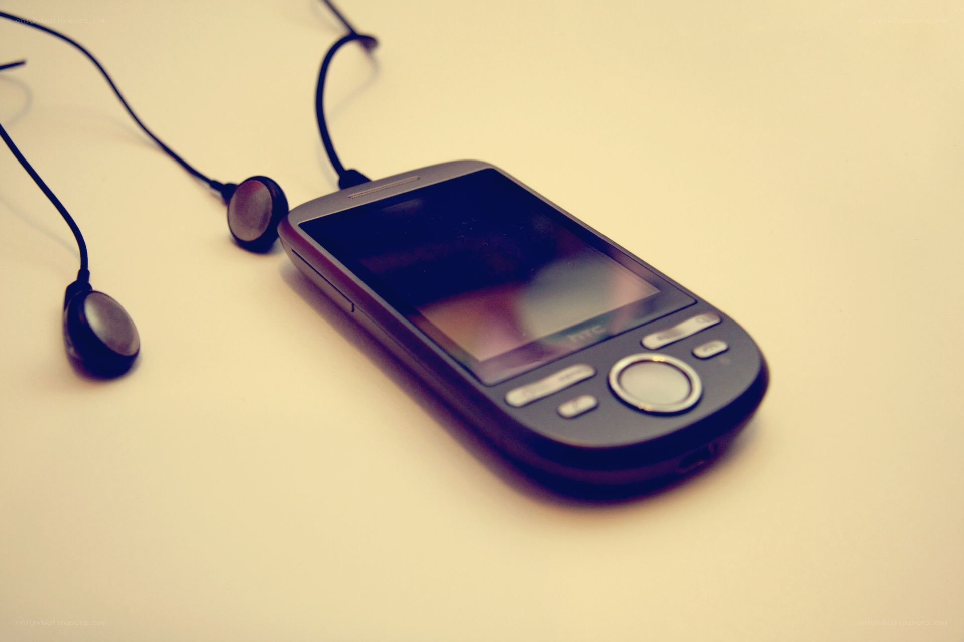 old htc phone with earbuds