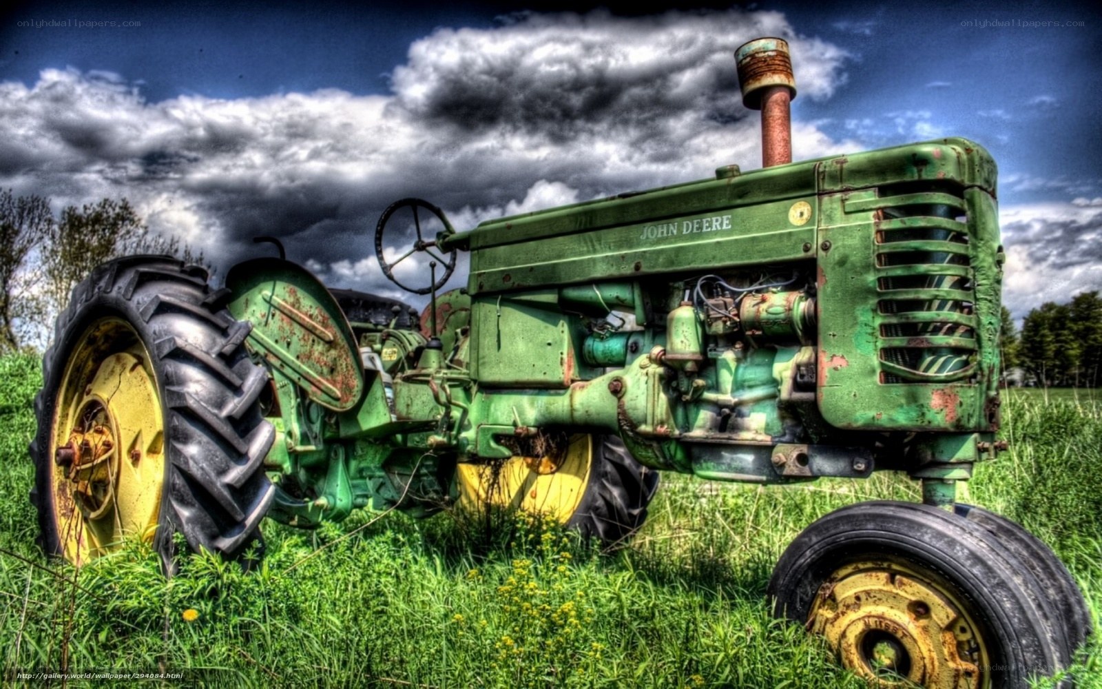 Old John Deere tractor in field