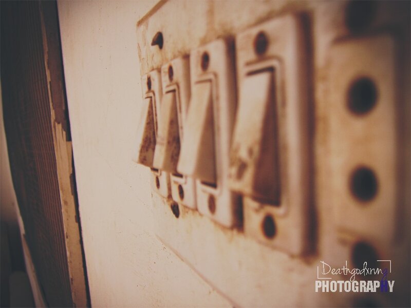 old light switches on wall
