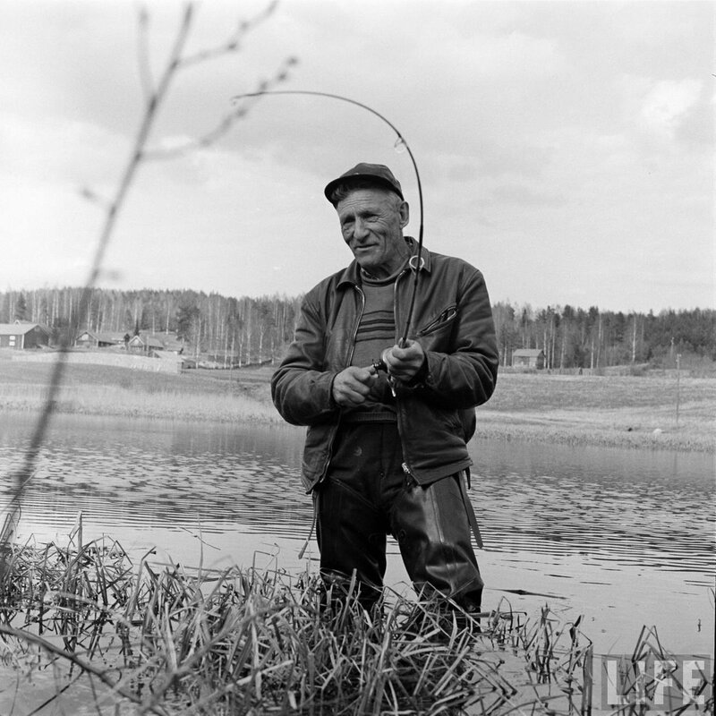 Old man fishing in a lake
