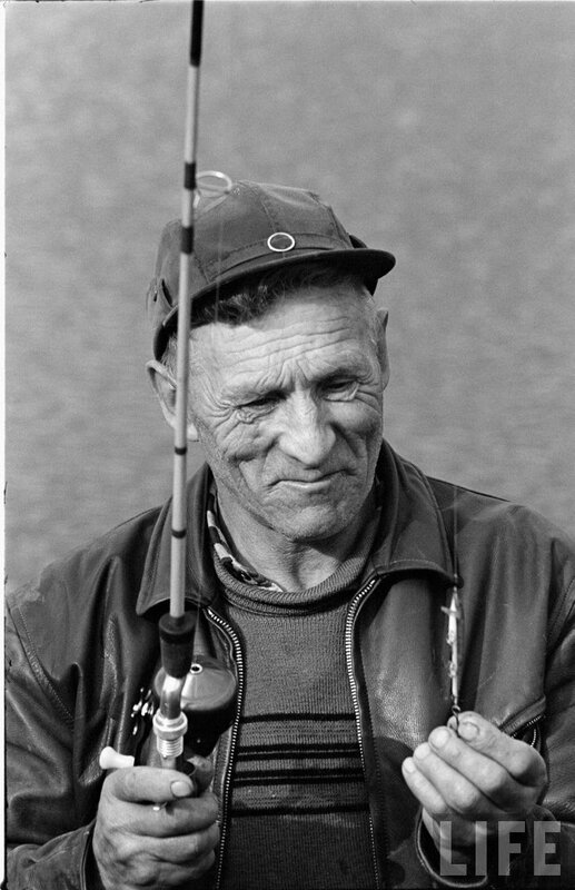 Old man fishing with rod