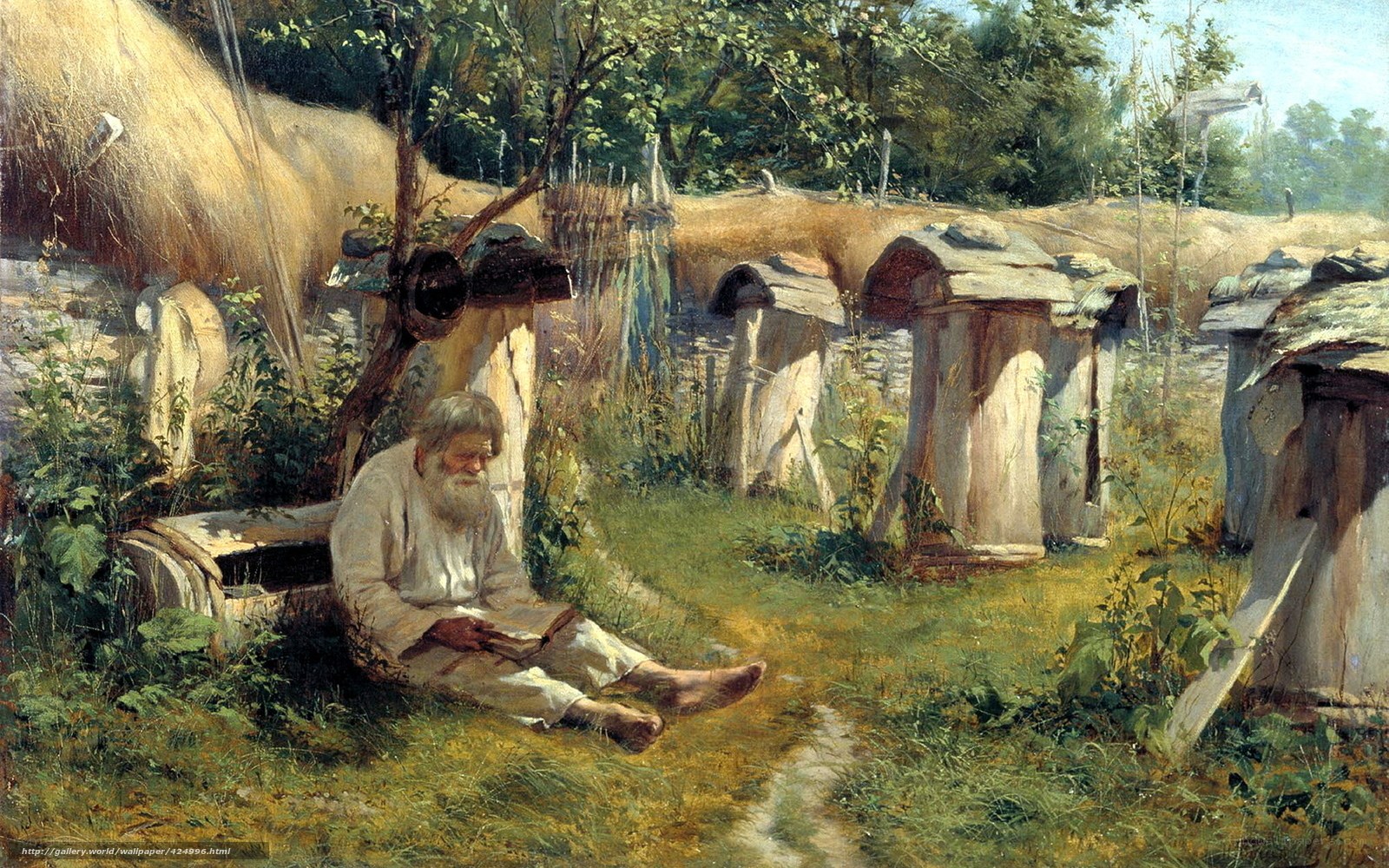 Old man reading in a garden