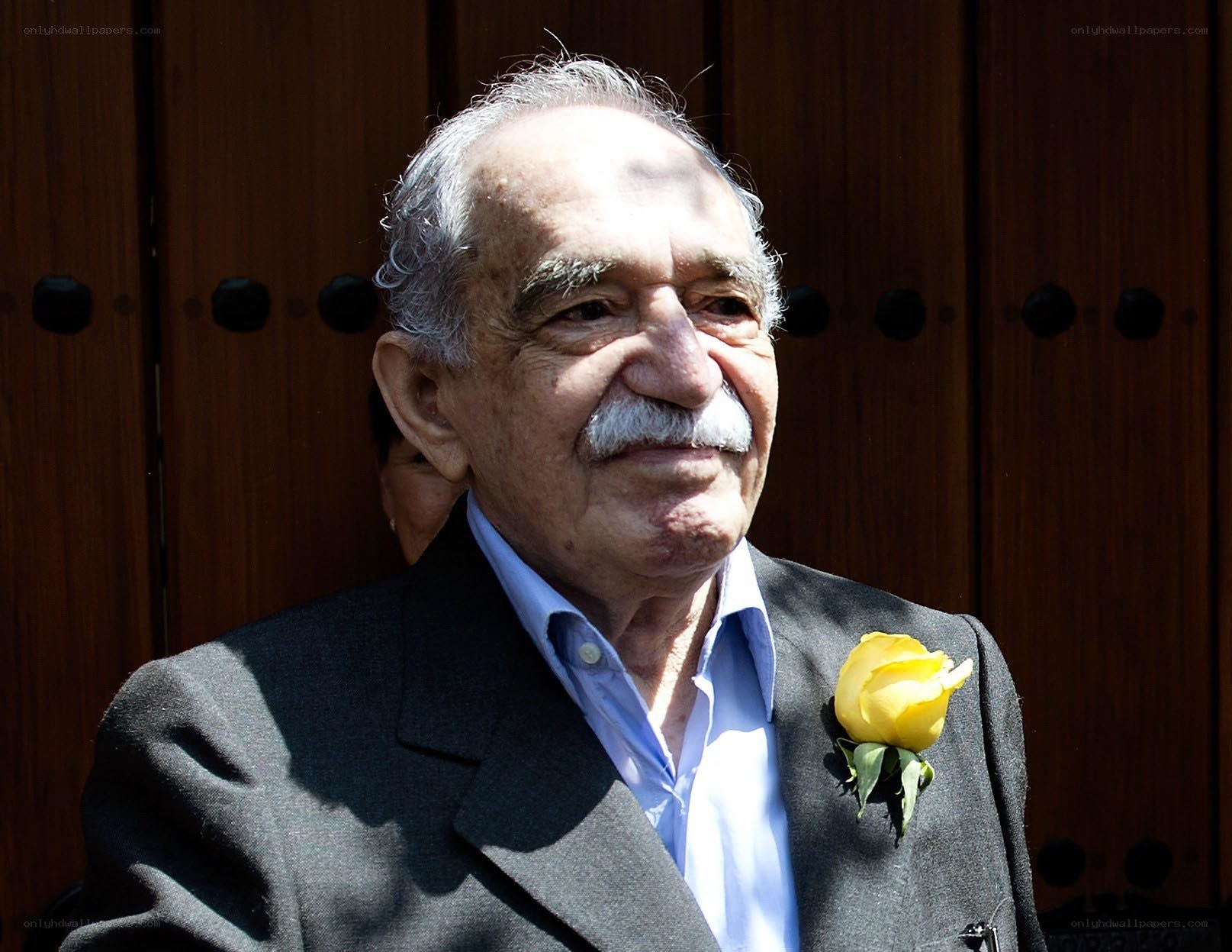 Old man with yellow rose