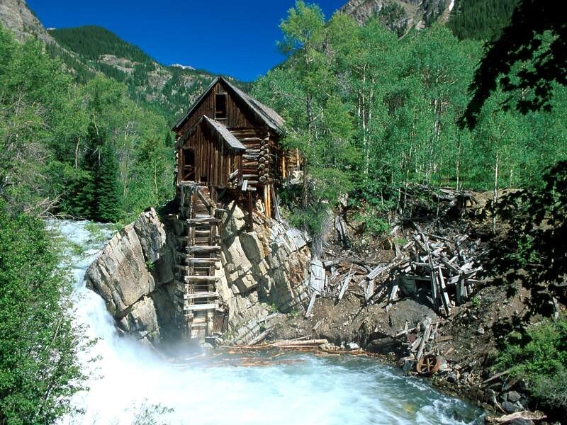 Old mill by a mountain river