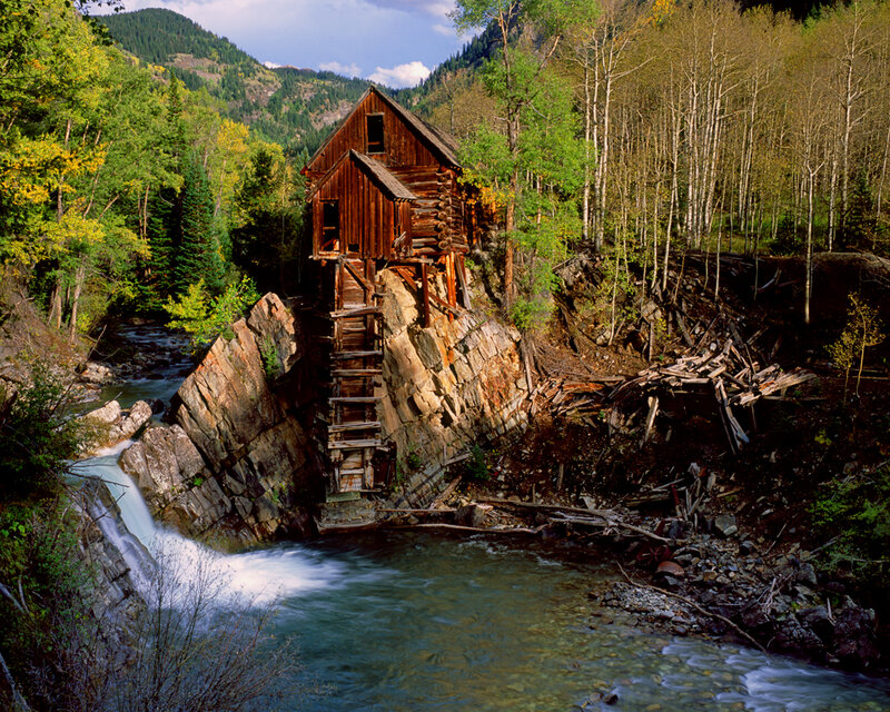 Old mill by a mountain stream
