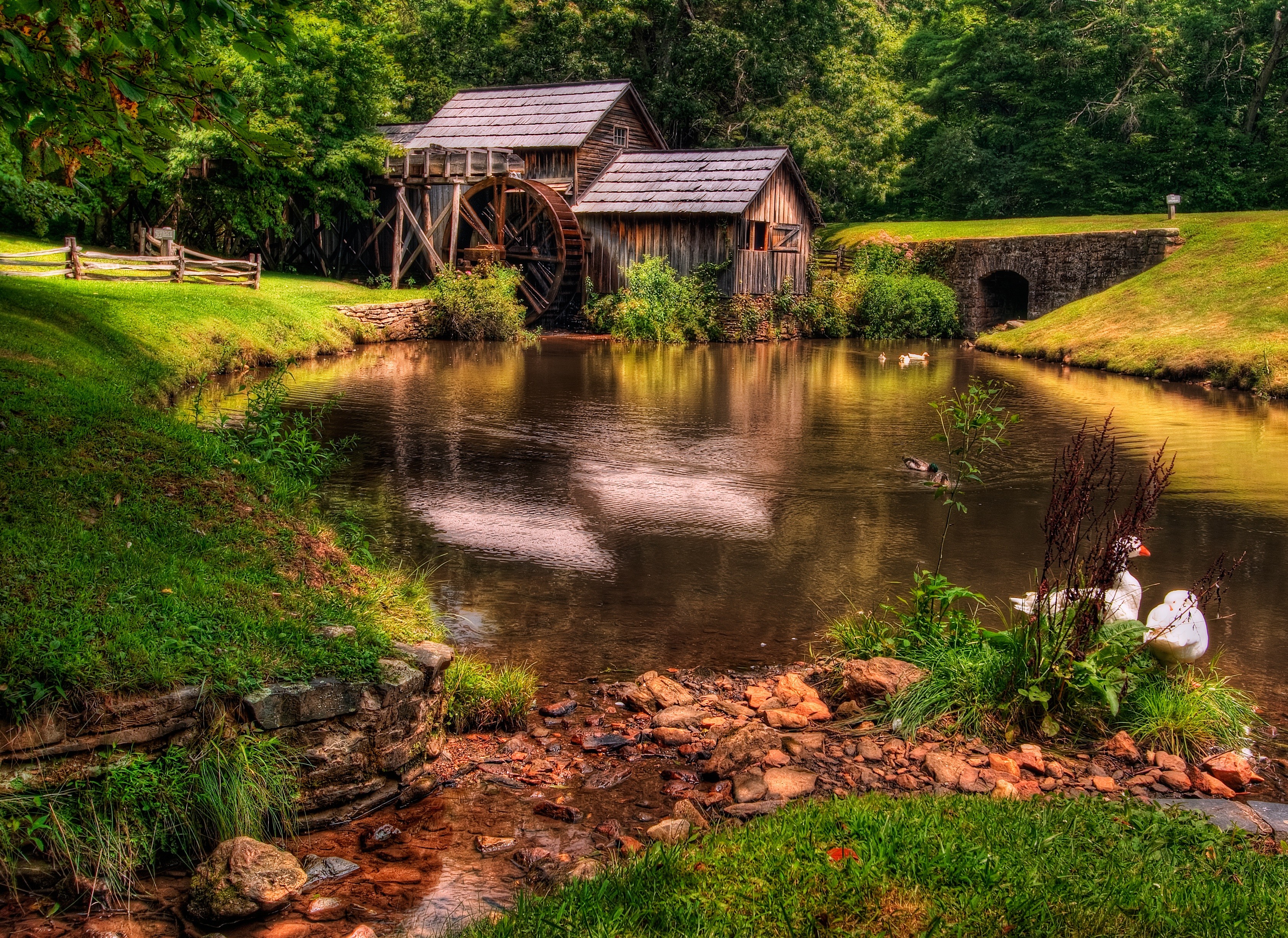 Old mill by a serene river