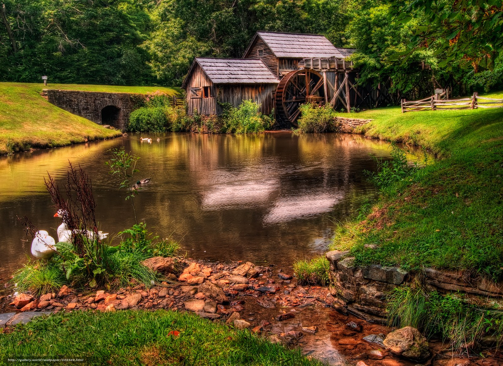 Old mill by a serene river
