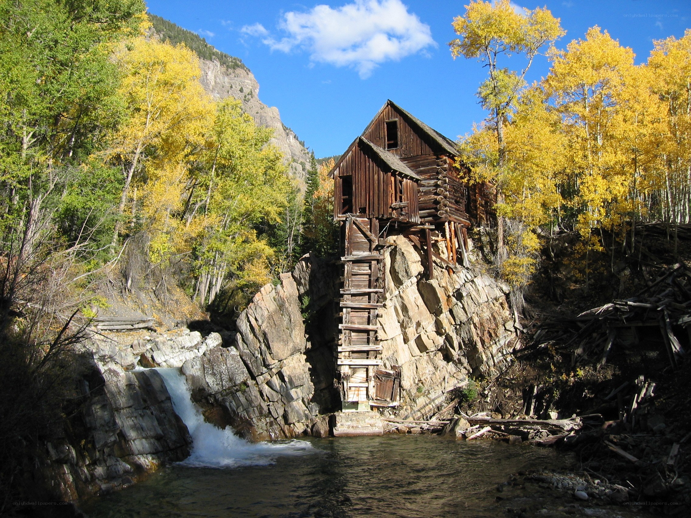 Old mill by a waterfall