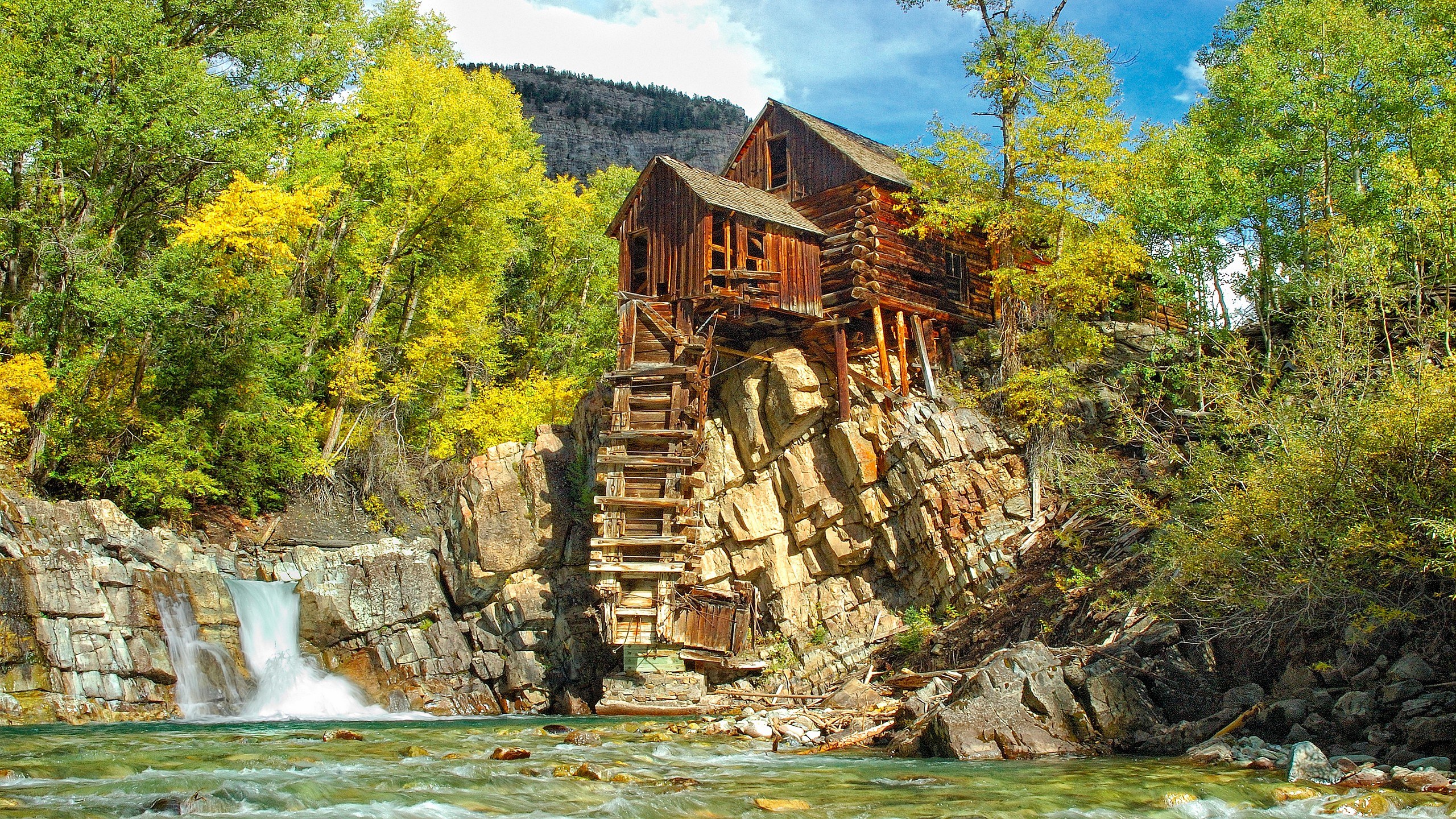 Old mill by a waterfall