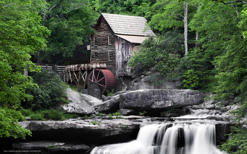 Old mill by a waterfall