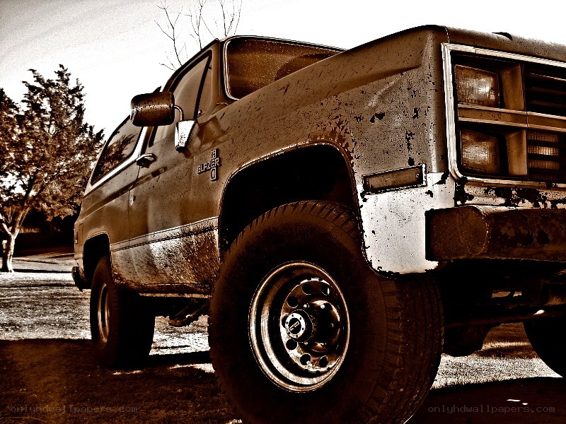 old muddy suv truck