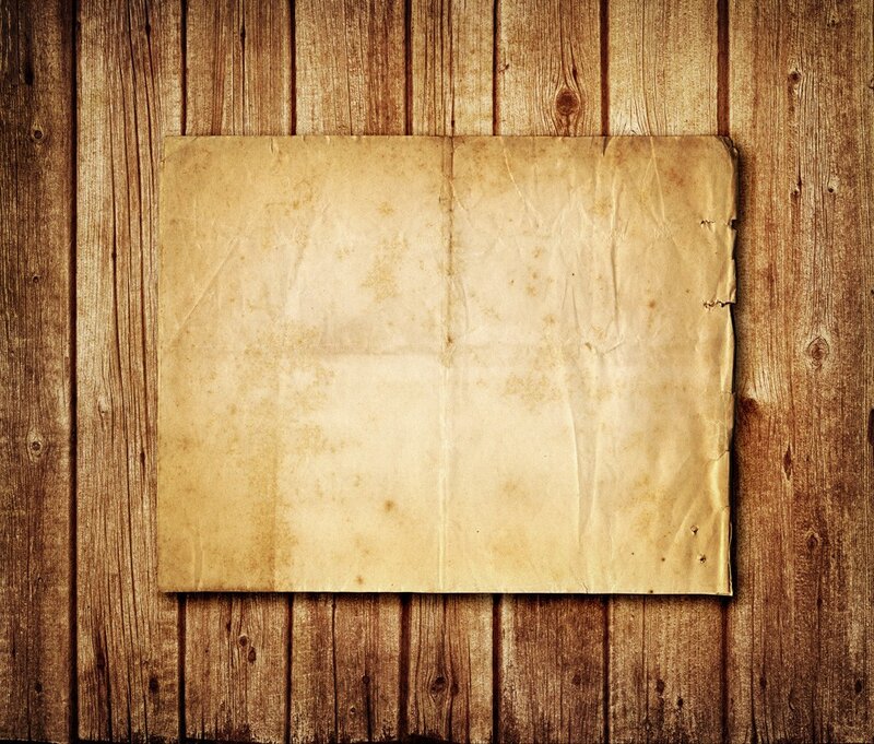 old paper on wooden wall