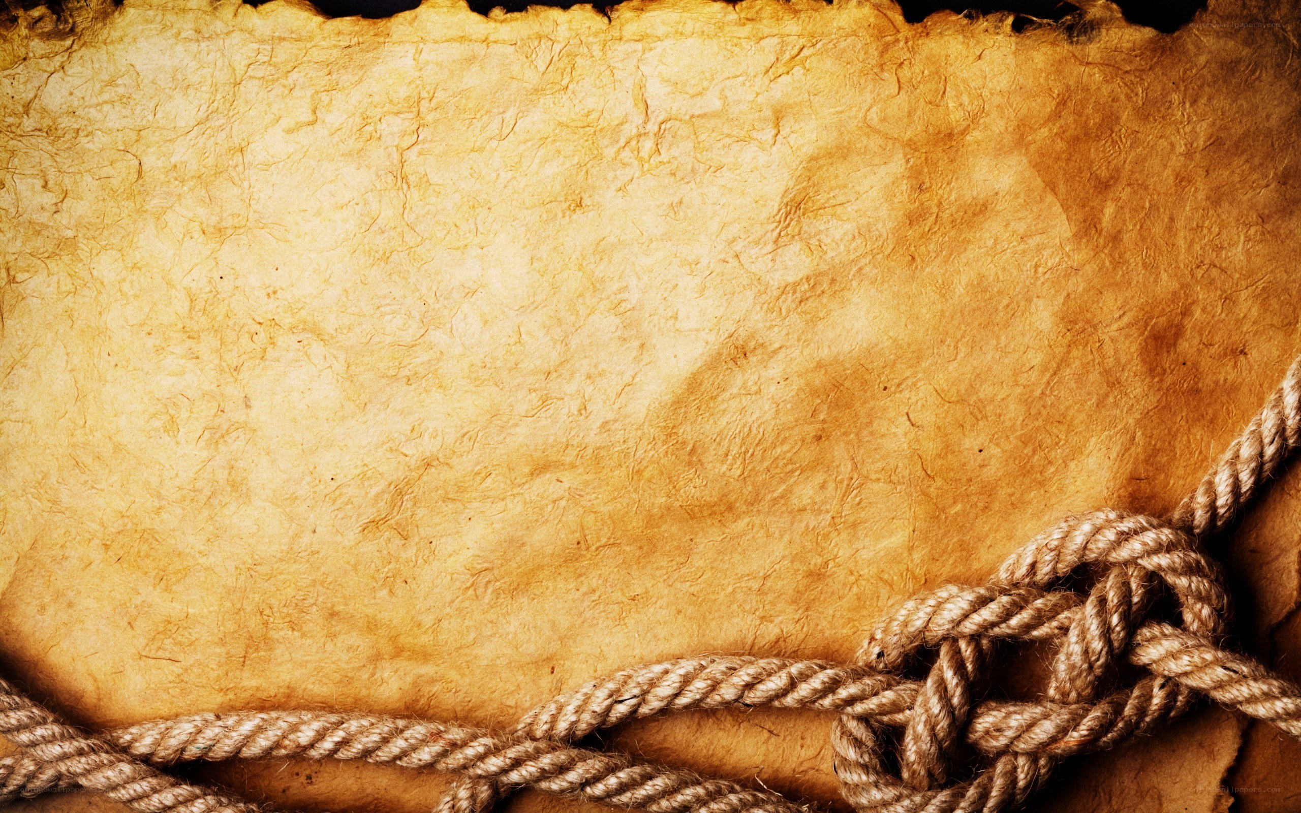 old parchment with rope knot
