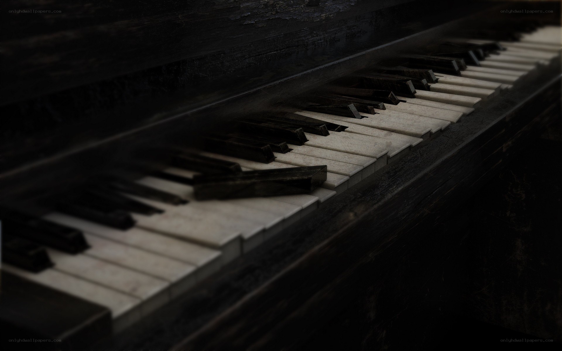 old piano keys in dim light