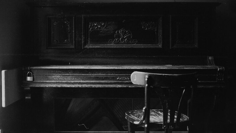 Old Piano with Chair