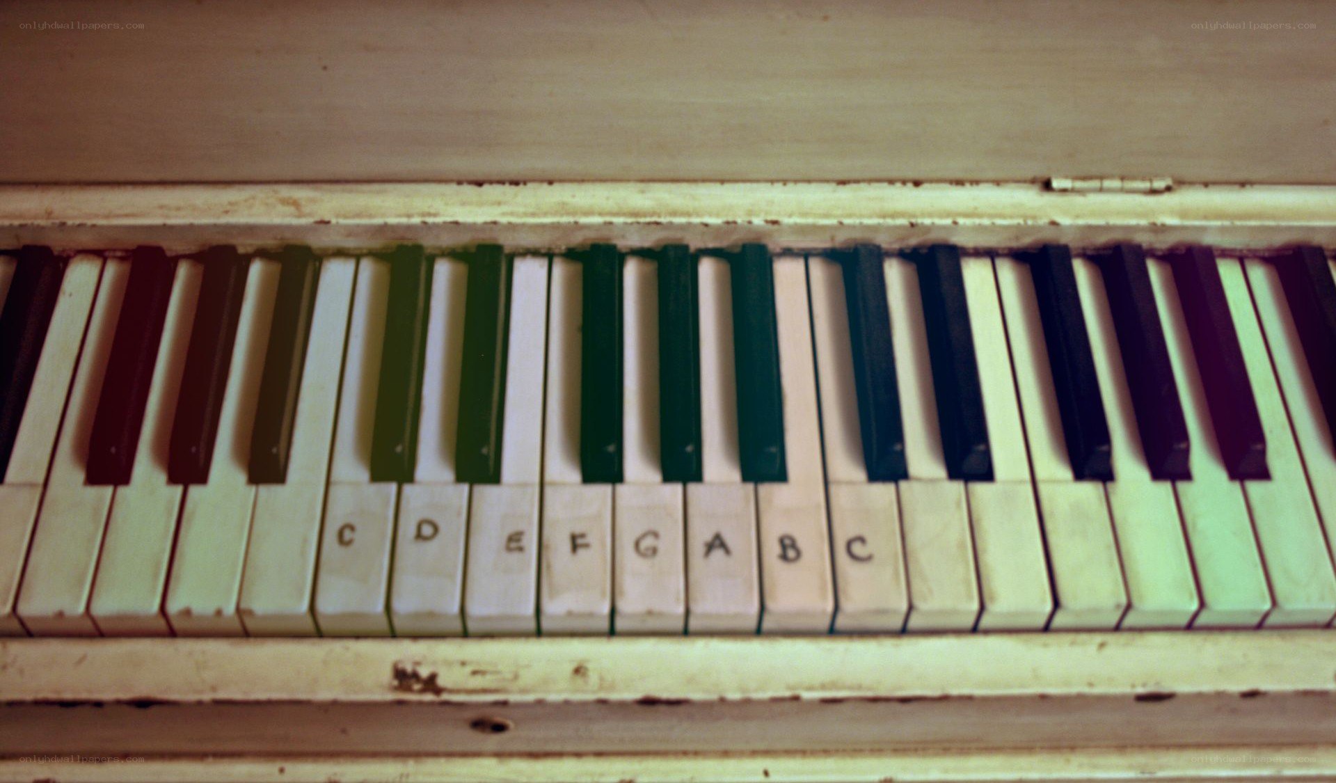 old piano with labeled keys