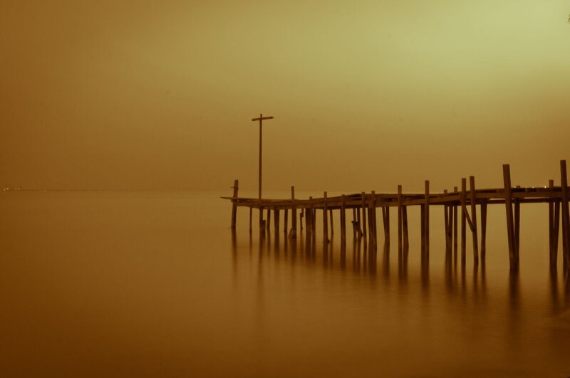 Old pier at sunset
