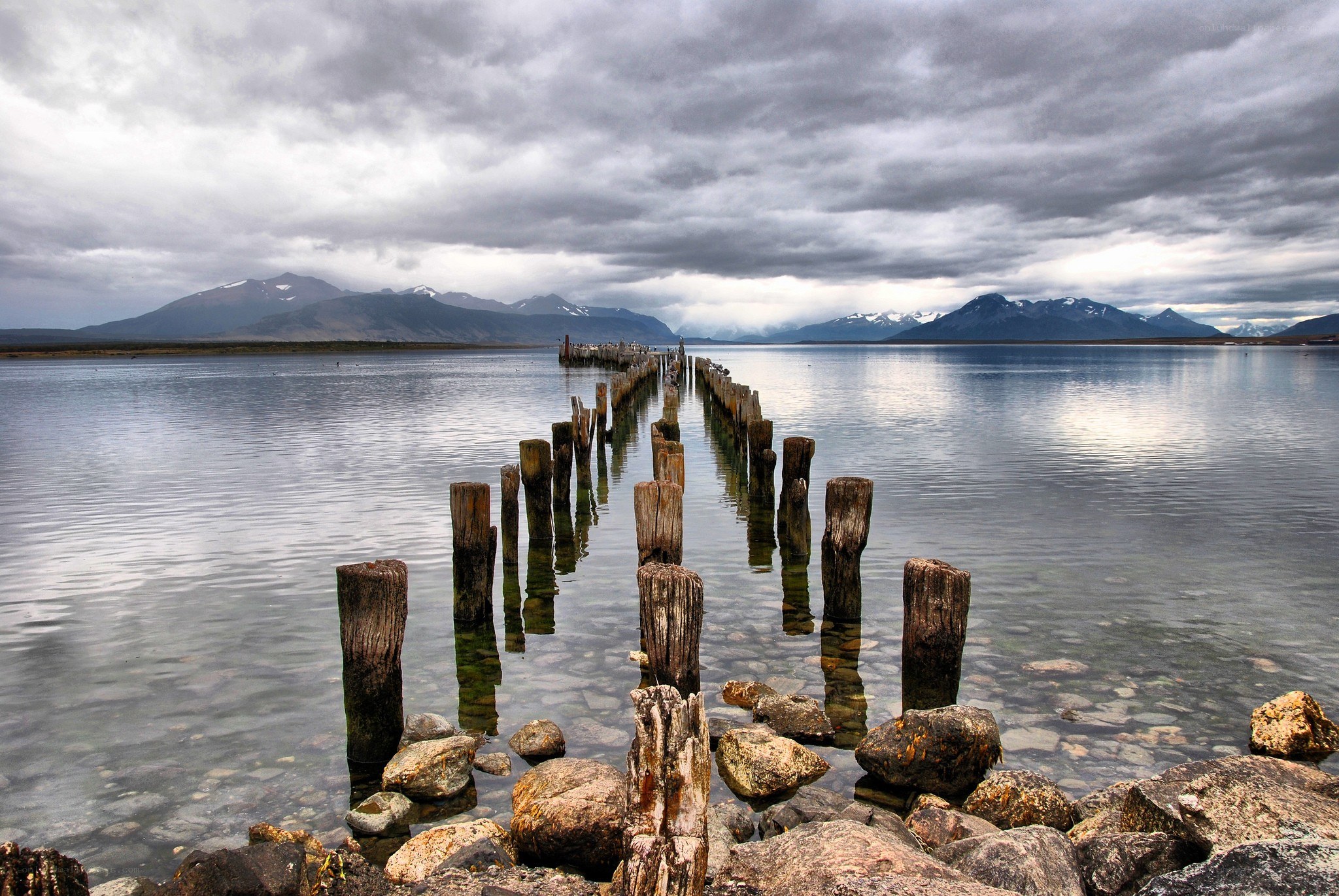 Old pier in a mountain lake